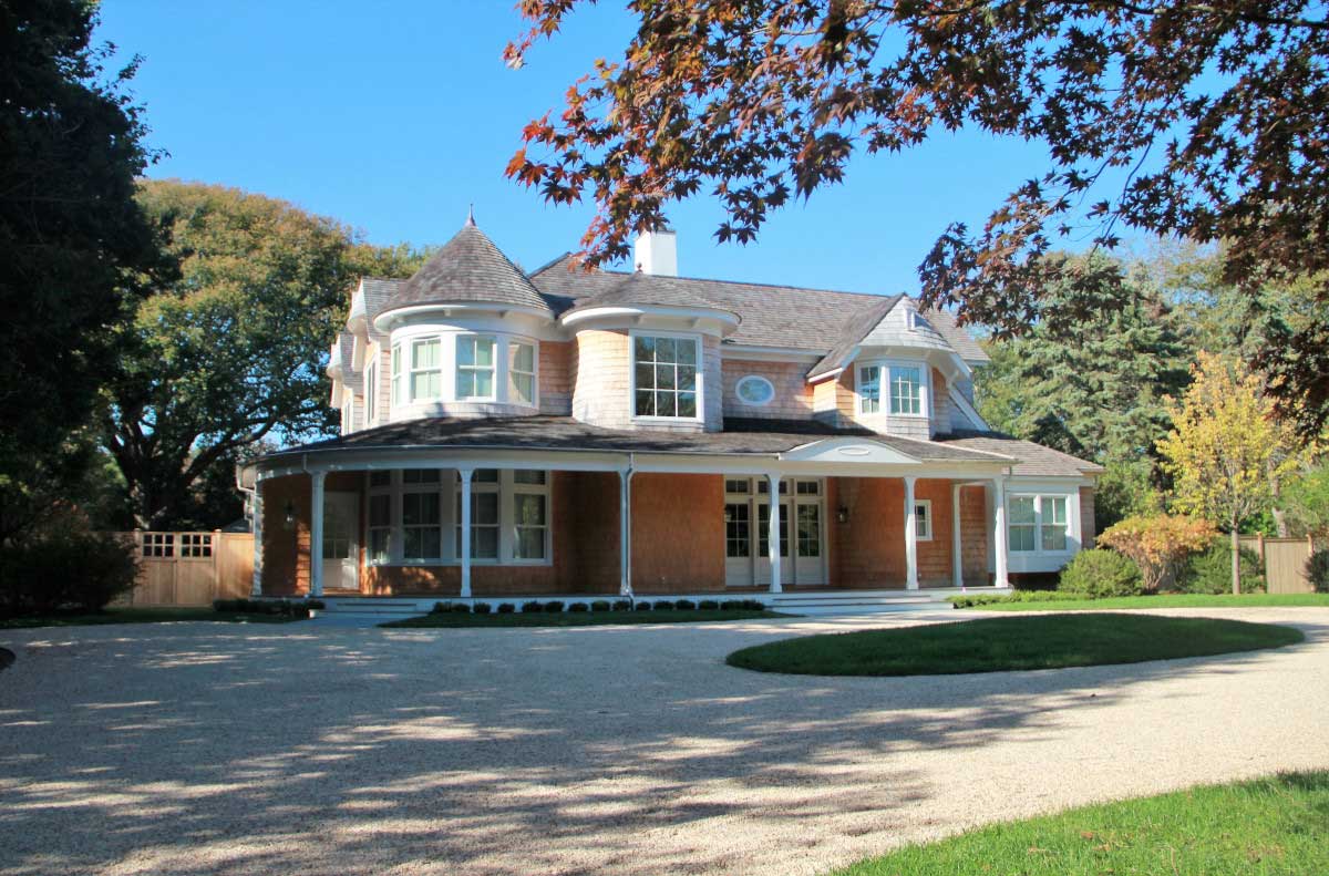 Transitional home with Pool House.  Shingle style exterior with more contemporary interior spaces.